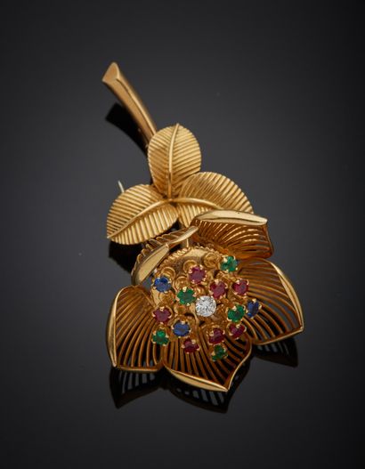 null MELLERIO - Two-tone 18K gold clip 750‰, in the form of a flower, on a branch...