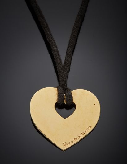null POIRAY - 18K yellow gold 750‰ pendant, "secret heart" design, with a black fabric...