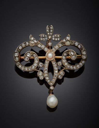 null Brooch in 18K yellow gold 750‰ and silver 2nd title 800‰, in a composition of...