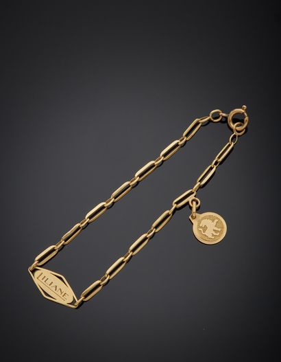 null Curb in 18K yellow gold 750‰, composed of oval links, engraved with the first...