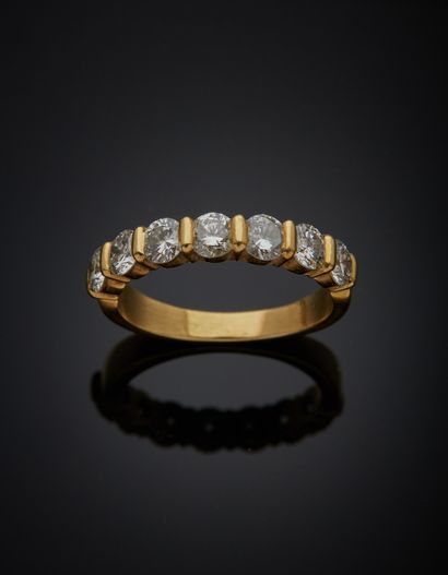null Half wedding band in 18K yellow gold 750‰, set with brilliant-cut diamonds....