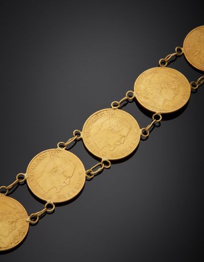 null Bracelet en or jaune 18K 750‰, paré de huit pièces de 10 francs (reproductions),...