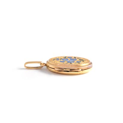 null 18K gold pendant 750‰ enhanced with an enameled flower design.
Misses, chips...
