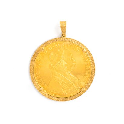null 18K yellow gold 750‰ pendant consisting of an Austrian ducat.
Wear consistent...