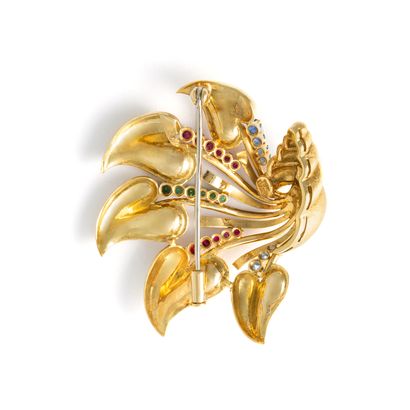 null 18K yellow gold 750‰ brooch set with round-cut blue, red and green stones. Italian...