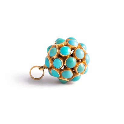 null 18K yellow gold 750‰ pendant representing a sphere entirely studded with cabochon-cut...