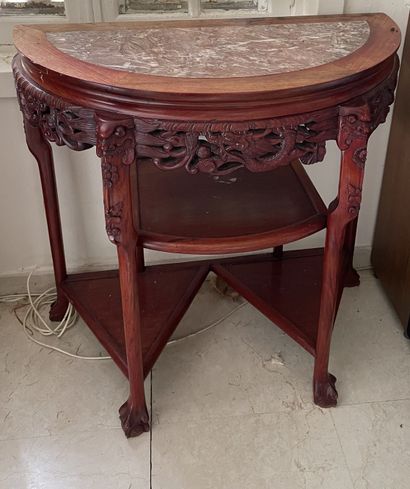 null Half-moon console in wood carved with dragons in belt. Marble top. Claw feet....