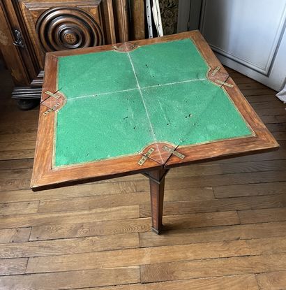 null Handkerchief table with folding tray in veneer opening to a drawer in the belt.
19th...