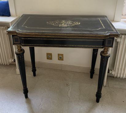 null Game table in black lacquered wood and brass fillets decorated with a flowering...