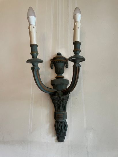 null Suite of four sconces in green and brown lacquered wood with carved decoration...