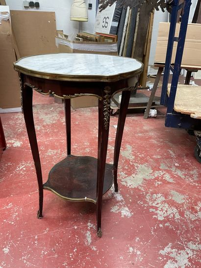 null Lot including a double tray tea table and a wooden pedestal table.
19th century....