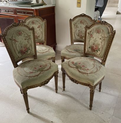 null Suite of 4 chairs in patinated and carved wood decorated with friezes and ribbon...