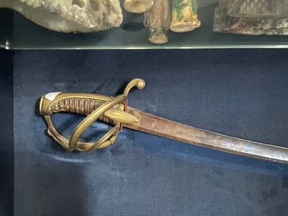 null Light cavalry saber. 
Restoration period. 
L. 95 cm 
Without its scabbard.