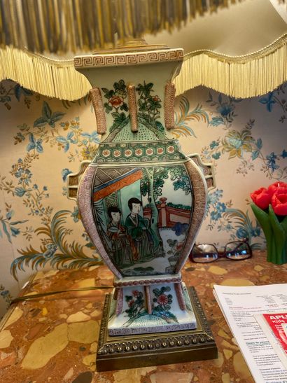 Vase in enamelled porcelain mounted as a...