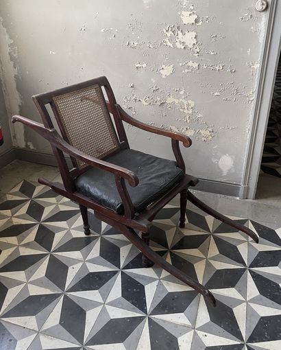 null Chair with cane back and seat. Turned tapered legs.
Carries a cartouche MAC...