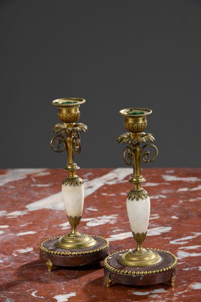 null Pair of gilt bronze, white and red marble candlesticks decorated with flowers...