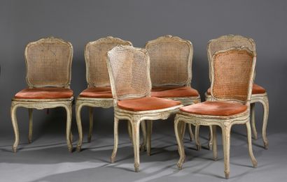 null Six cabriolet chairs in grey beech wood carved with flowers. 
Louis XV style....