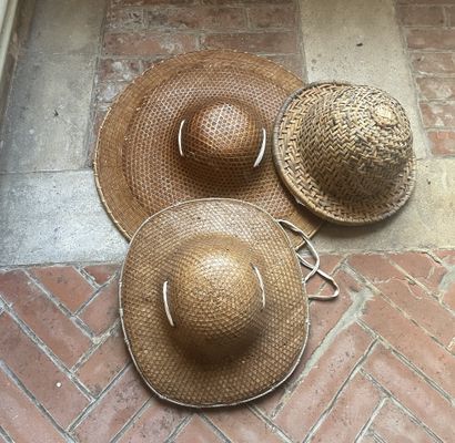 null Three straw hats.
