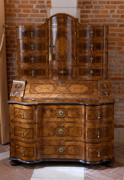 null Scriban chest of drawers with an inlaid walnut and walnut burl veneer front...