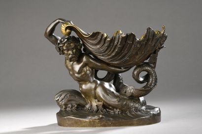null Attribué à Claudius MARIOTON (1844-1919) 
Triton portant une coquille
Bronze...