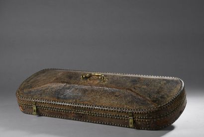 null TWO VIOLIN BOX with stave lid, in wood covered with studded leather. 
Around...