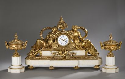 null A gilt bronze and white marble CHIMNEY CLOCK comprising a clock decorated with...