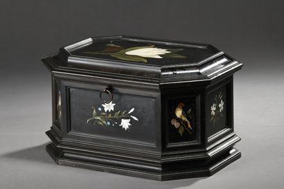 null OCTOGONAL CASE in molded blackened wood decorated with nine black marble plaques...