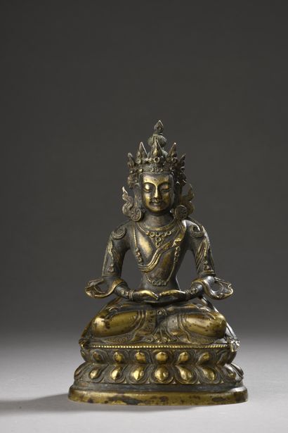 null Bronze STATUTE depicting Amithayus seated in padmasana on an inverted double...