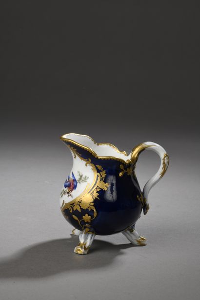null SEVRES
Three-legged milk jug in soft porcelain with polychrome decoration of...