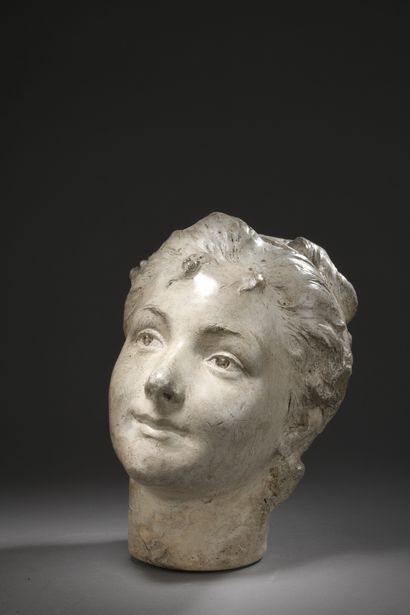 null French school around 1900
Head of a woman
Proof in patinated plaster. 
H. 28...