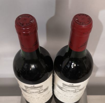 null 2 bouteilles Château LEOVILLE LAS CASES 1989 - 2e Gcc Saint Julien 
Niveaux...