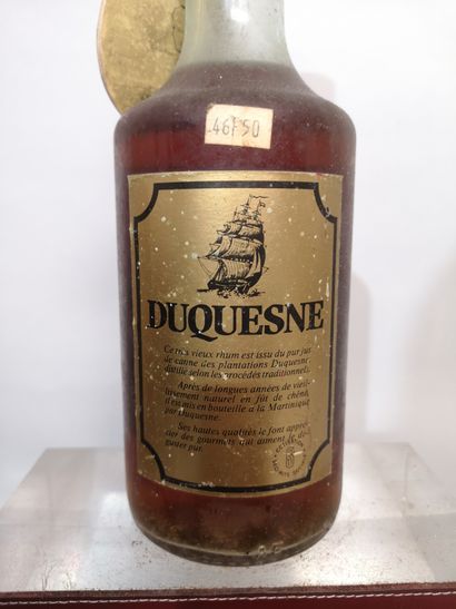 null 1 bottle 70cl RHUM Martinique "10 years old" - DUQUESNE 
Label slightly pit...