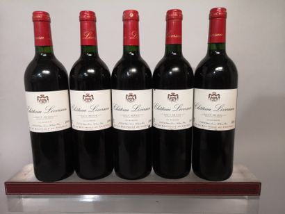 null 5 bouteilles Château LIVERSAN 2001 - Haut Médoc 
Étiquettes légèrement grif...