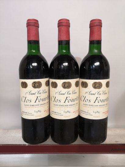 null 3 bouteilles CLOS FOURTET 1986 - Saint Emilion Grand Cru 
Étiquettes légèrement...