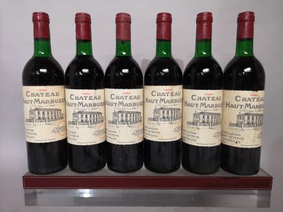 null 6 bouteilles Château HAUT MARBUZET 1990 - Saint Estèphe 
Étiquettes légèrement...
