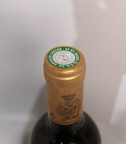 null 1 bouteille Château GRUAUD LAROSE 1994 - 2e Gcc Saint Julien 
Etiquette légèrement...