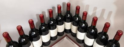 null 12 bouteilles Château du PEYRAT GODIN 1999 - Haut Médoc 
1 niveau mi épaule...