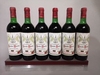 null 6 bouteilles Château SAINTE MARIE 1986 - Pomerol 
Étiquettes légèrement tachées....