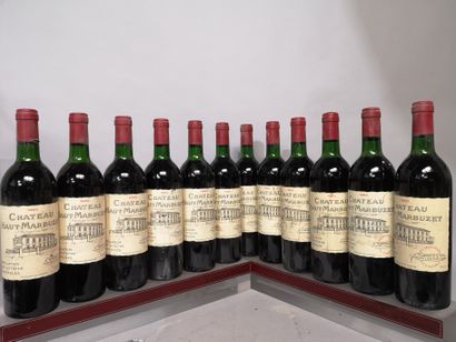 null 12 bouteilles Château HAUT MARBUZET 1985 - Saint Estèphe 
Étiquettes légèrement...