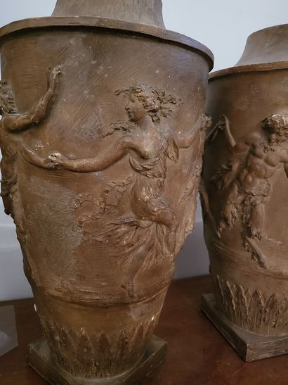 null In the taste of Clodion, circa 1900
Pair of terra cotta vases with bas-relief...