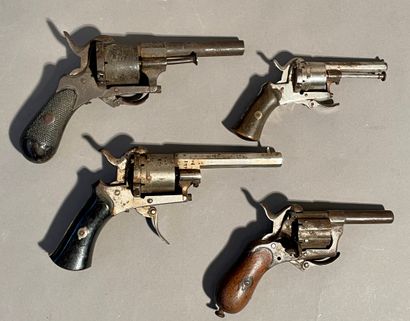 Four revolvers, with pin. 
Calibers 7 and...