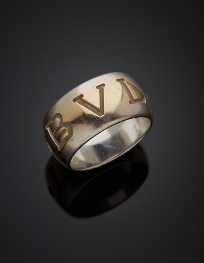 null BVLGARI - Two-tone 18K gold 750‰ band ring, "Monologo" model, engraved with...