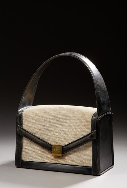 null HERMÈS 24.Fg St Honoré - Deauville bag in black canvas and leather, gilt metal...