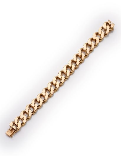 null HERMÈS - 18K yellow gold 750‰ bracelet, nutted gourmette design, fitted with...