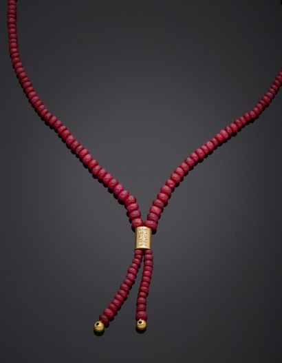 Ruby bead necklace (treated), adorned with...