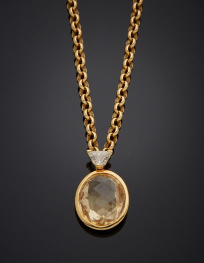 null Necklace in 18K yellow gold 750‰, adorned in pendant with a yellow and oval...