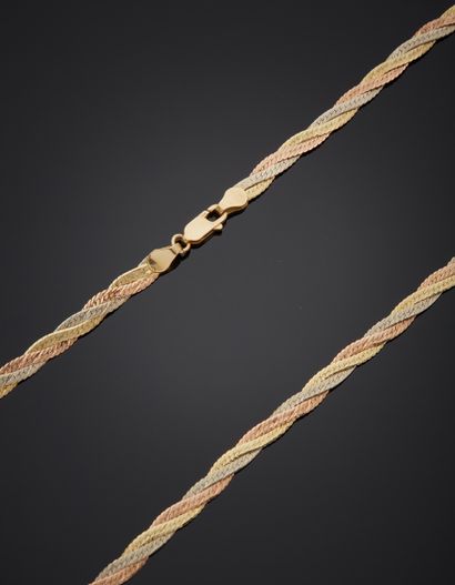 null Polychrome 14K gold necklace 585‰, consisting of a braid of three links. Handcuff...