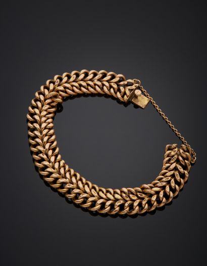 null Curb in 18K yellow gold 750‰, American mesh. Ratchet clasp in the mesh with...