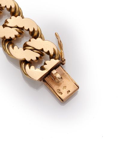 null HERMÈS - 18K yellow gold 750‰ bracelet, nutted gourmette design, fitted with...