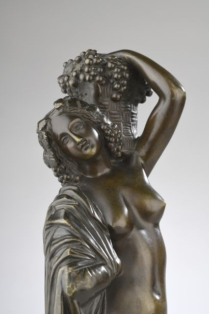 null James Pradier (1790-1852)
Nude woman carrying a basket 
Bronze with brown patina
Signed...